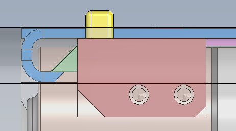 Section view showing latch subsystem installed in housing